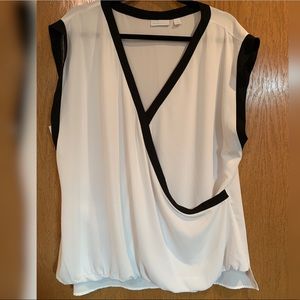 White blouse with black trim
